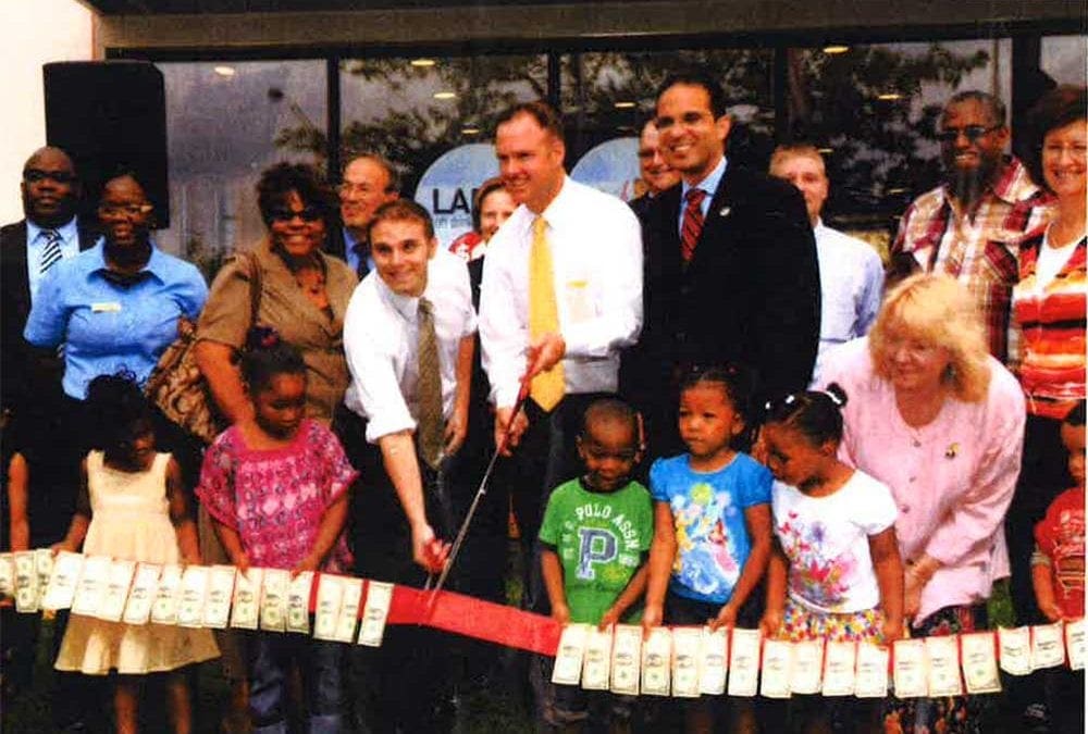 Napoli Management is proud of its long-standing commitment to community involvement including this throwback to the grand opening celebration of our Trinity Square location together with McAuley Village program graduates and Angel Taveras, former Mayor of Providence